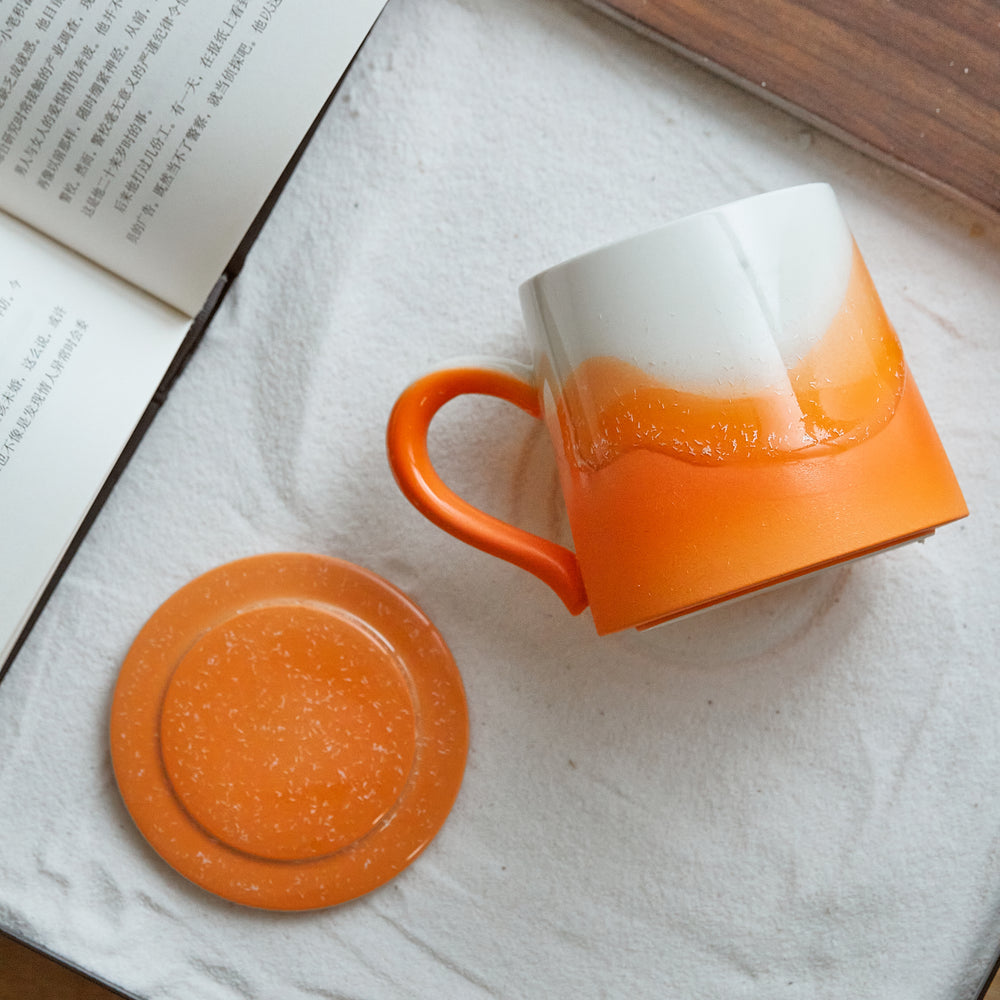 
                  
                    Orange ceramic mug
                  
                