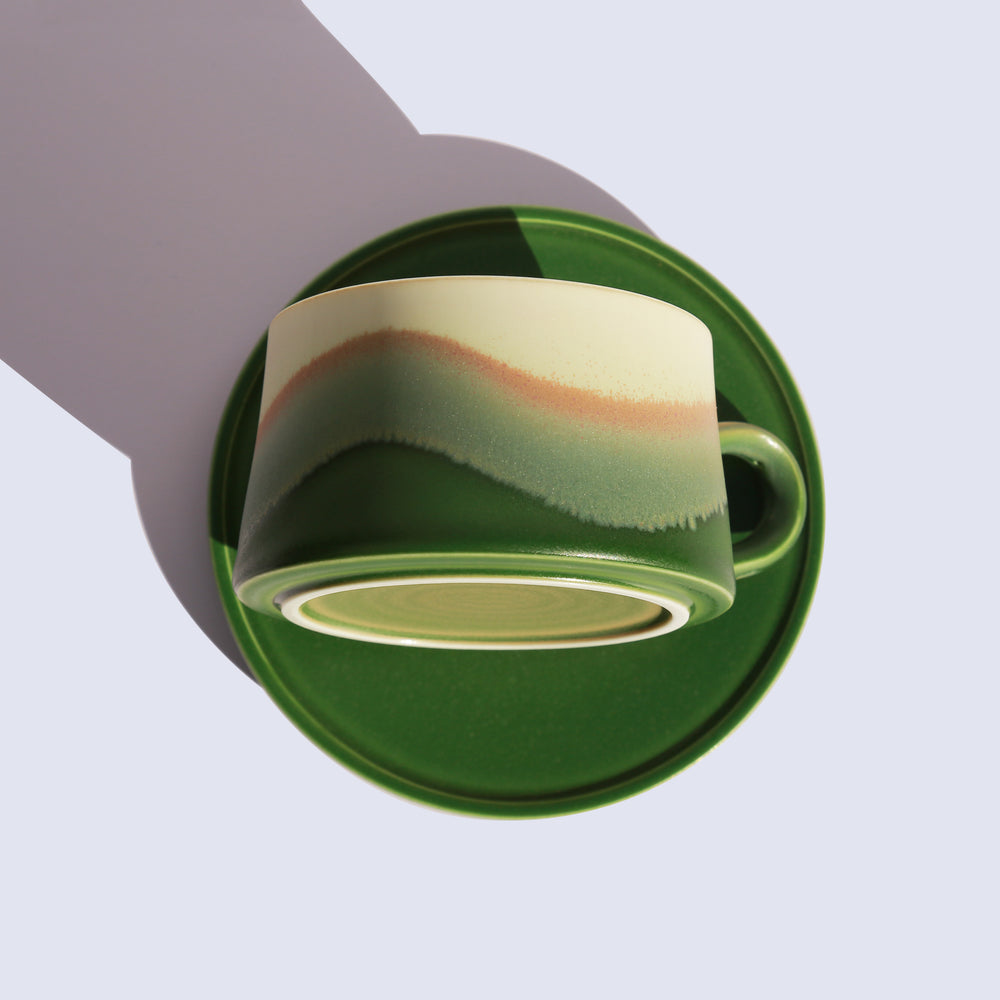 
                  
                    Green coffee cup
                  
                