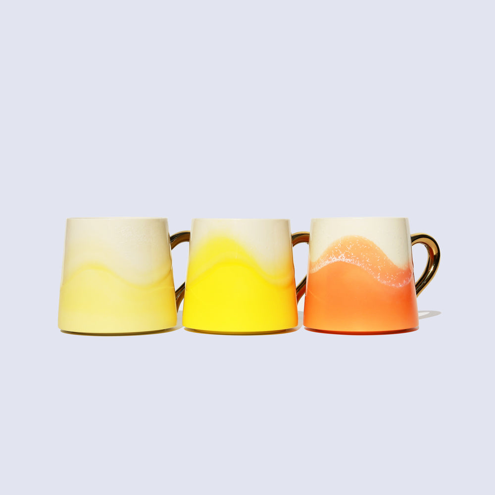 
                  
                    Orange Coffee Mug with Gold Handle
                  
                