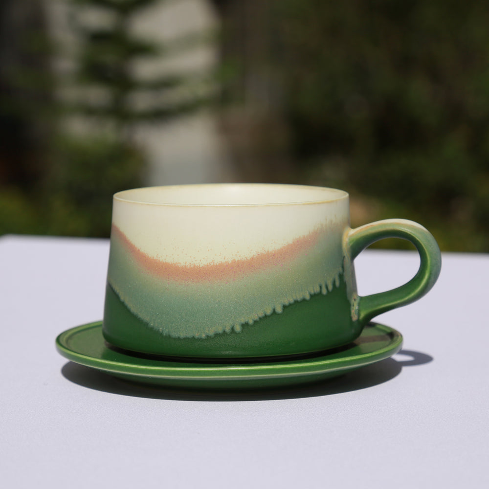 
                  
                    Green coffee cup
                  
                